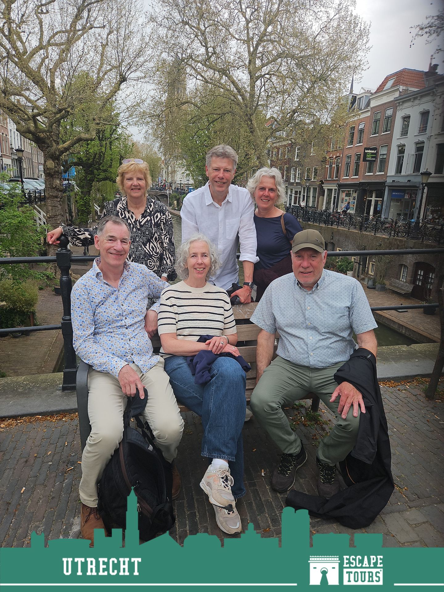 Teamfoto van ff met je bek in het zonnetje